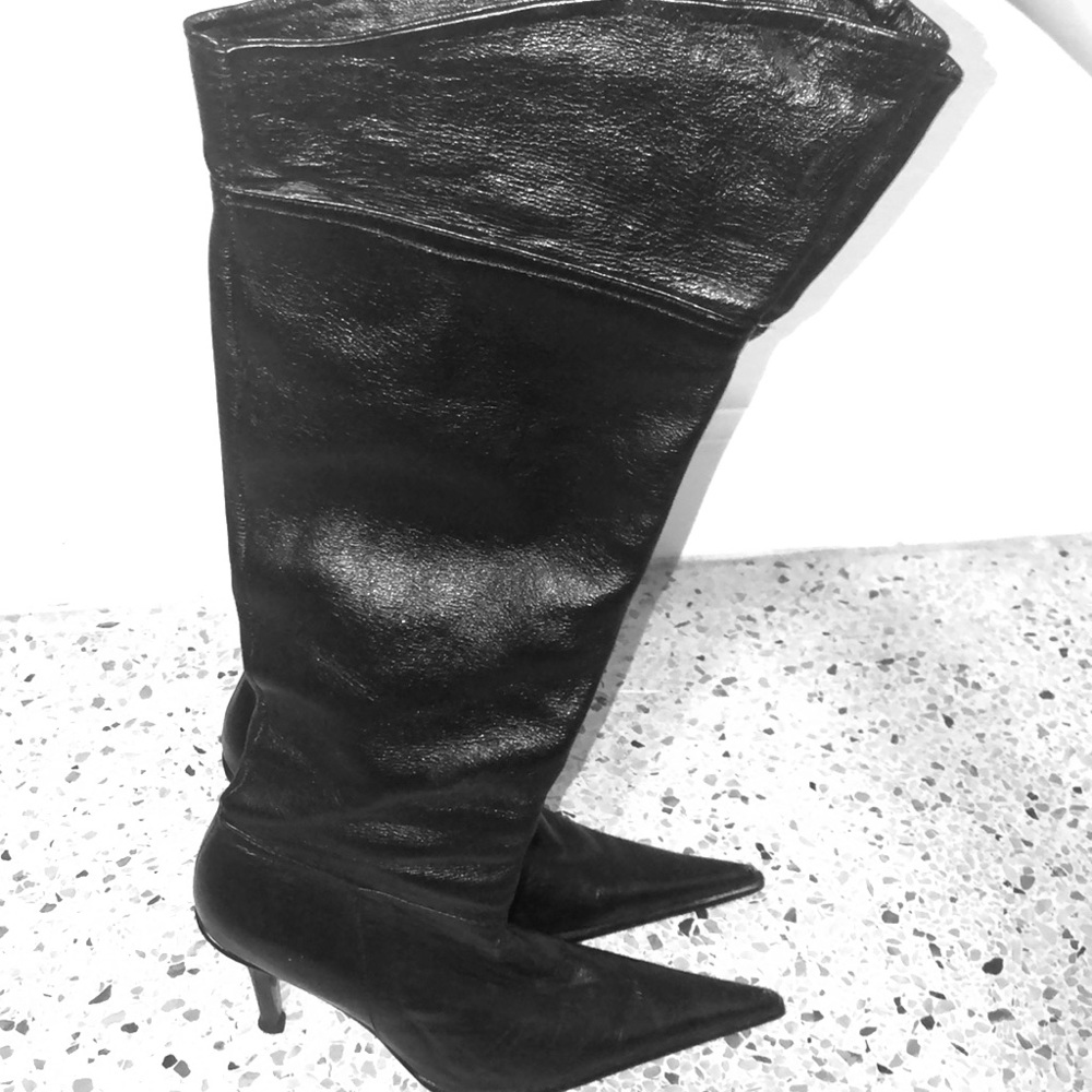Black knee high boots.